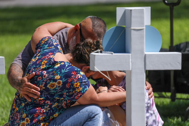 The mourners are visiting the monument to the victims of the mass shooting on Tuesday at the elementary school in Uvalde, Texas. 