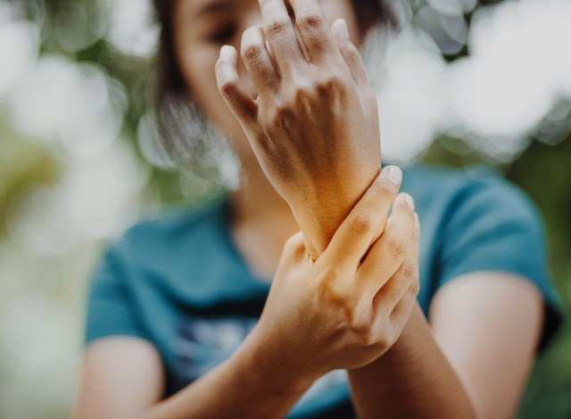 a woman with joint pain