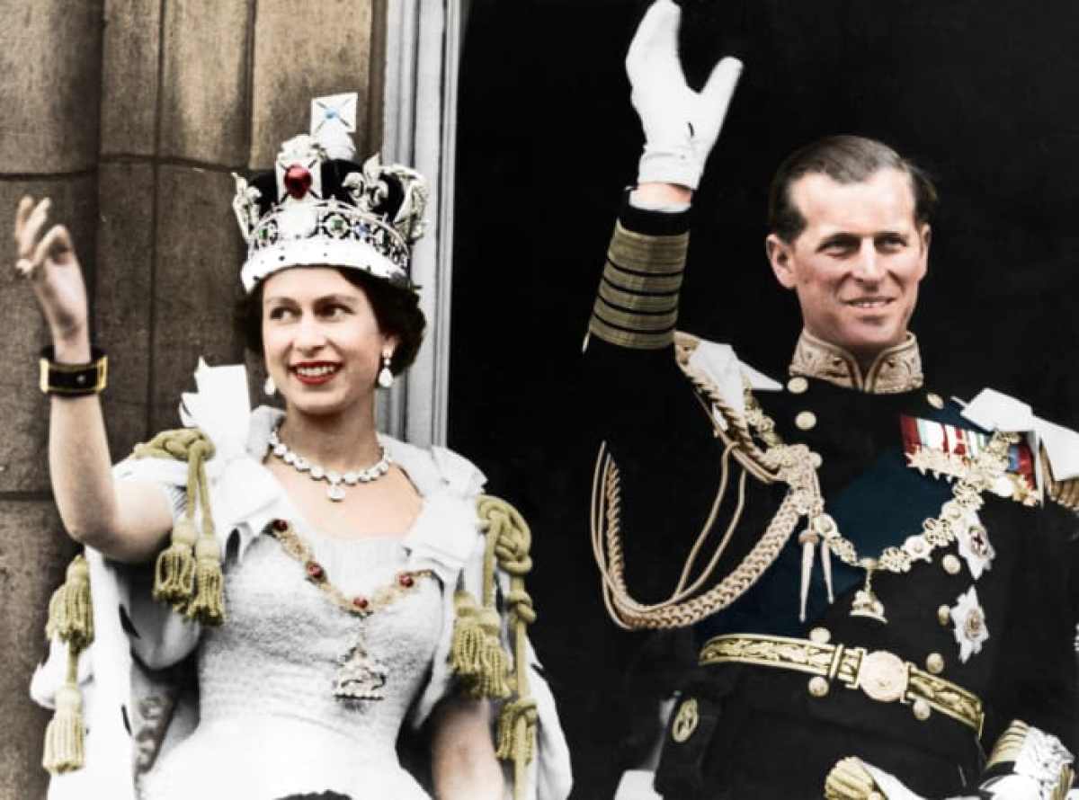 Queen Elizabeth II and the Duke of Edinburgh on the day of their coronation, Buckingham Palace, 1953 (Black and white color print).  Artist Unknovn.  (Photo by The Print Collector / Getty Images)